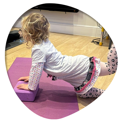 child doing yoga